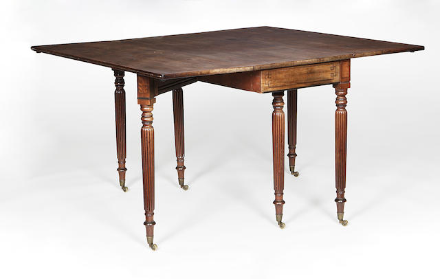 A late Regency mahogany gate leg table