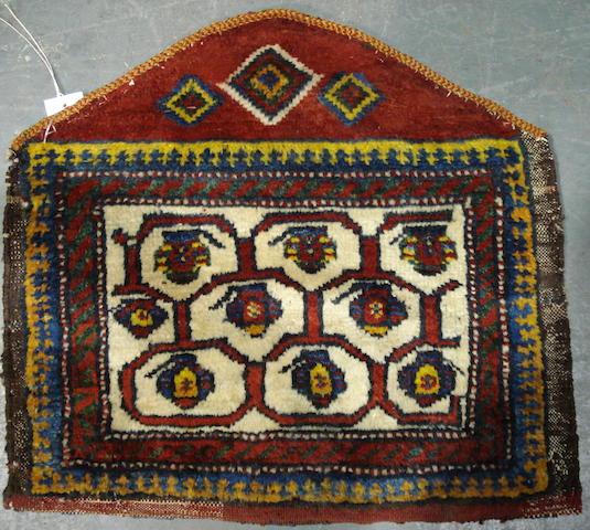 A Luri saddle West Persia, 1 ft 11 in x 1 ft 9 in (59 x 54 cm)