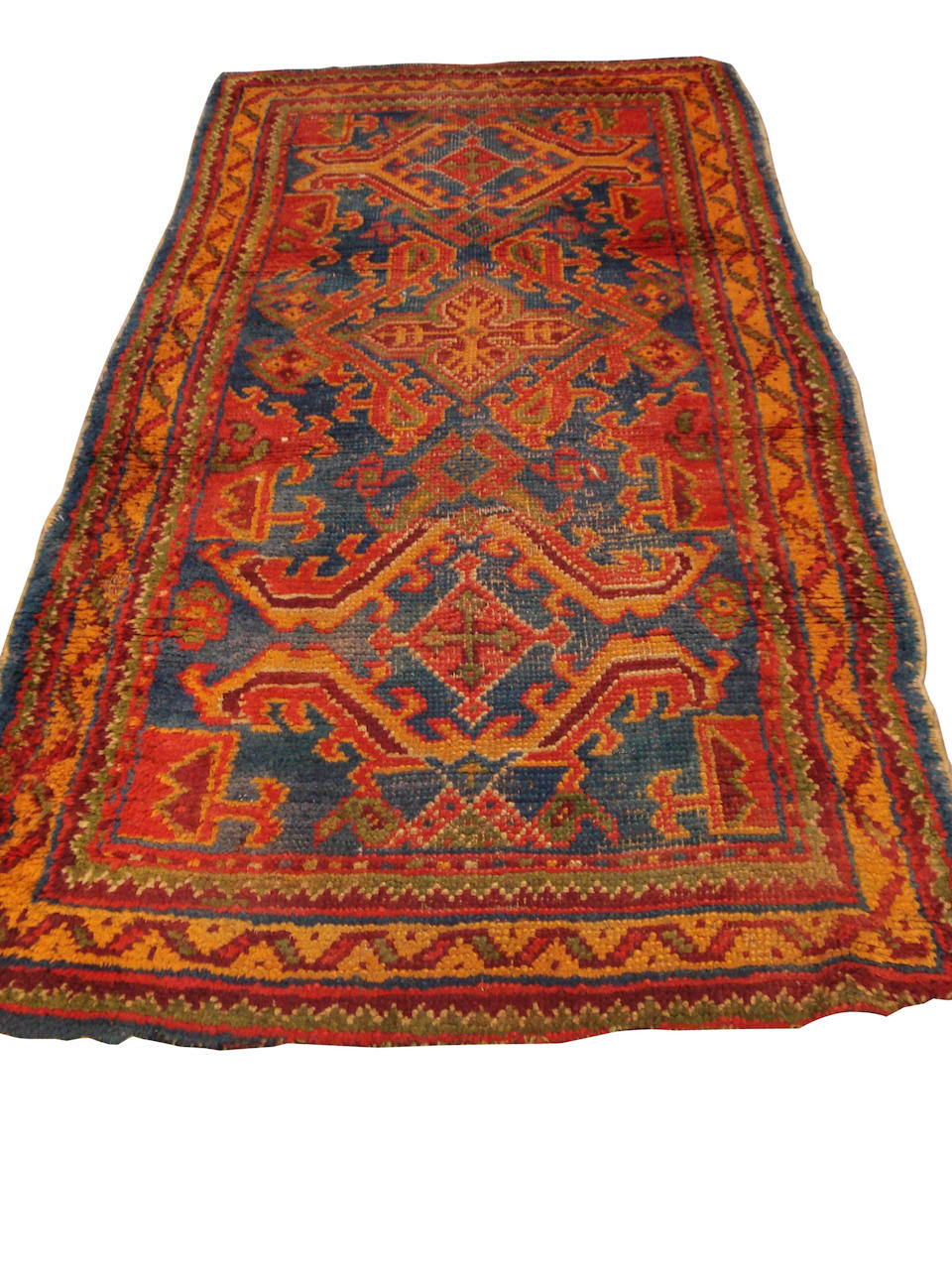 An Ushak rug West Anatolia, 7 ft x 3 ft 5 in (214 x 104 cm) some wear