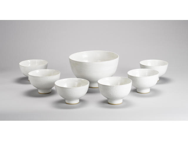 Dame Lucie Rie a set of six soup Bowls and a Tureen, circa 1958 Diameter of Tureen 22.5cm (8 7/8in.) Diameter of Bowls 13.5cm (5 3/8in.)
