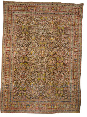 A Tabriz carpet North West Persia, 14 ft 5 in x 10 ft 5 in (435 x 317 cm)very minor restoration