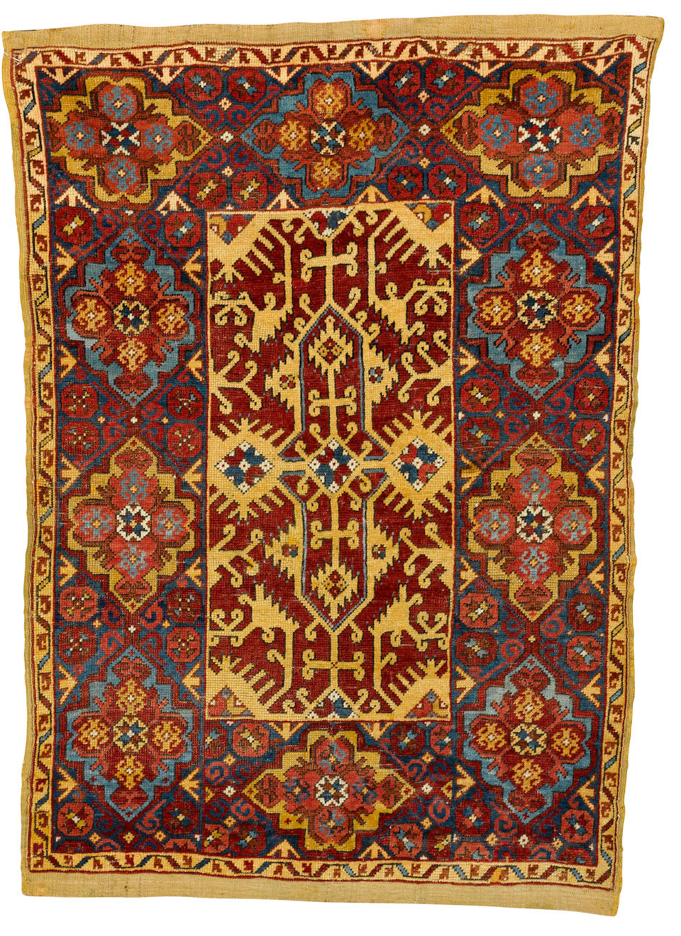 An Ushak rug of Lotto design West Anatolia, late 18th century 5 ft 6 in x 3 ft 10 in (168 x 117 cm ) restorations