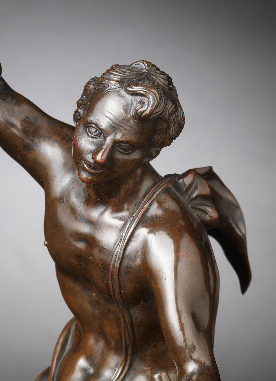 Francesco Bertos, Italian (1678-1741) A bronze group of 'Intellect carving Truth'