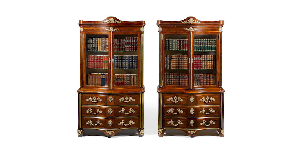 An important pair of Victorian Exhibition model kingwood crossbanded and parquetry serpentine Bookcase/Commodes by Gillows