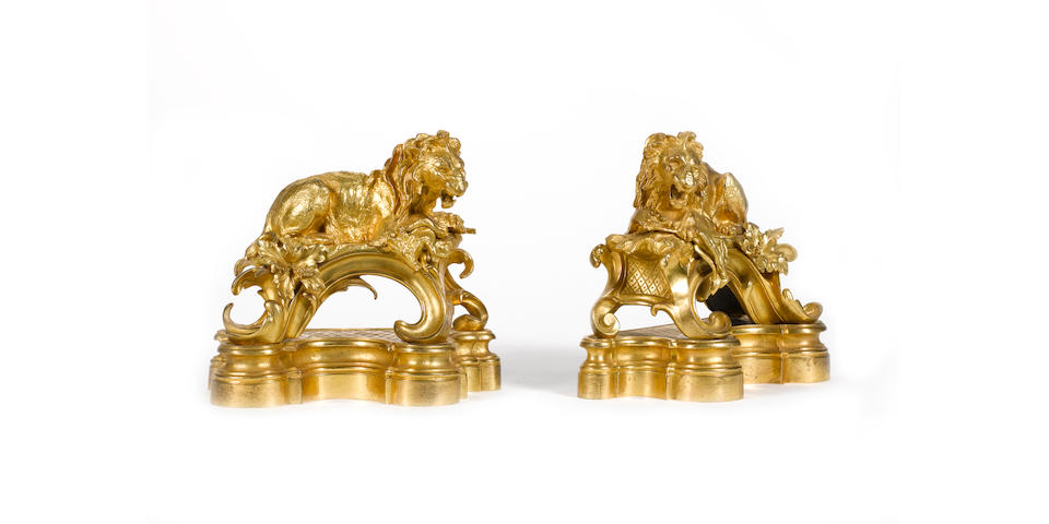 A pair of Louis XV gilt bronze chenets with crowned C poin&#231;on Circa 1745