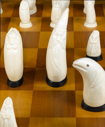 Bonhams : An Inuit sperm whale tooth chess set, Canada, circa 1920
