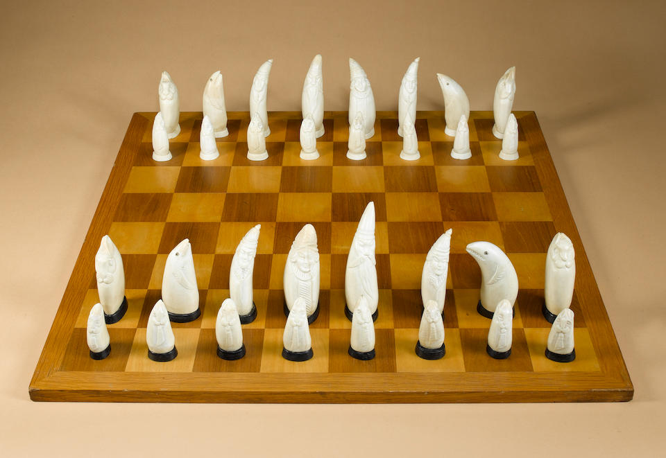 Bonhams : An Inuit sperm whale tooth chess set, Canada, circa 1920