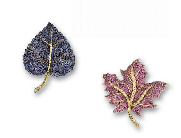 A set of two gem set leaf brooches (2)