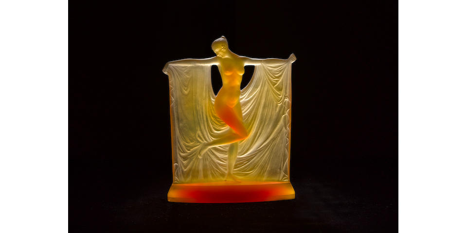 Ren&#233; Lalique 'Suzanne' a Rare Amber Glass Figure, design 1925