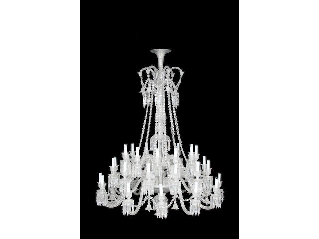 A Baccarat style cut glass thirty six light two tier chandelier