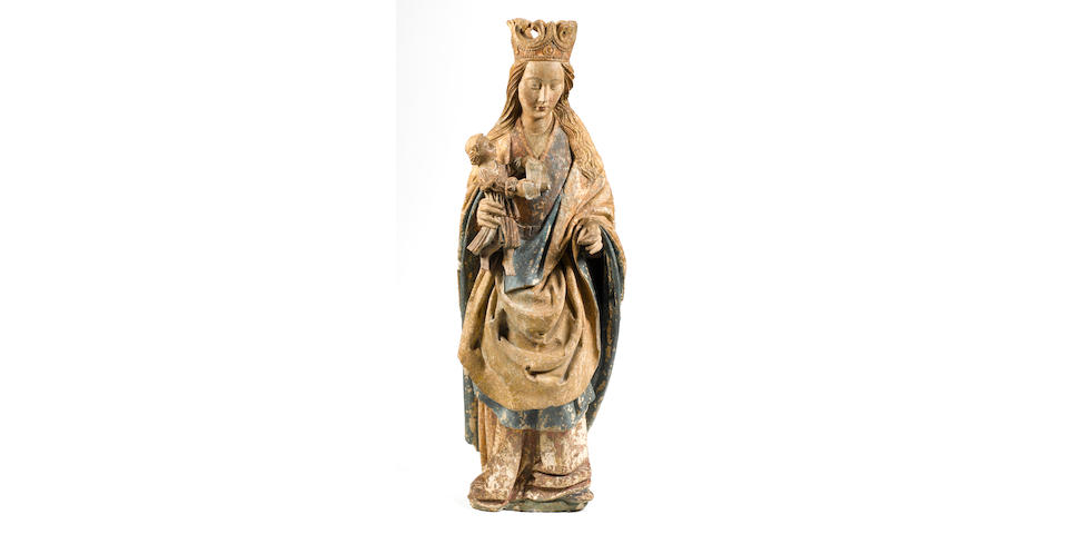 A French early 15th century limestone / composition (?)polychrome decorated figure of the Virgin and