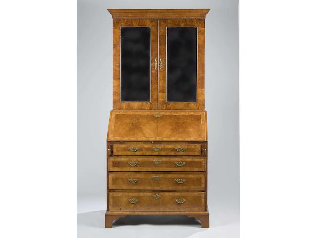 An 18th century and later walnut bureau cabinet