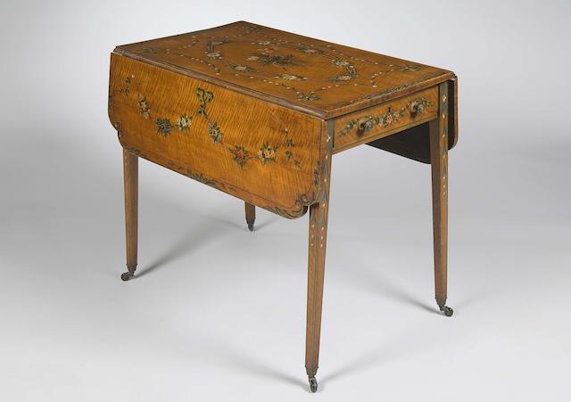 A late 19th century satinwood and polychrome decorated Pembroke table