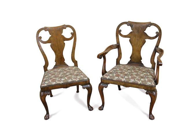 A set of eight early 20th century walnut dining chairs circa 1920