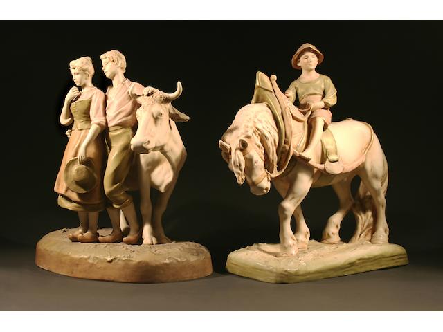 A pair of early 20th century Royal Dux figure groups