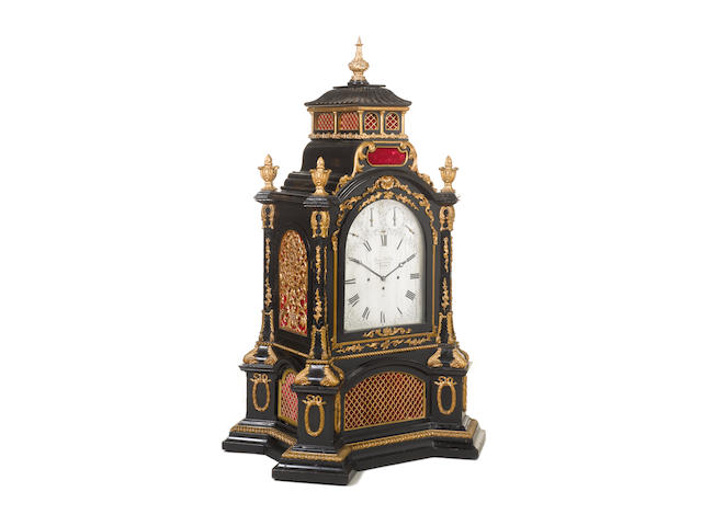 A large and impressive mid 19th century double-dialled quarter-striking and musical ormolu-mounted ebonised bracket clock with full calendar James McCabe, Royal Exchange, London, numbered 3192