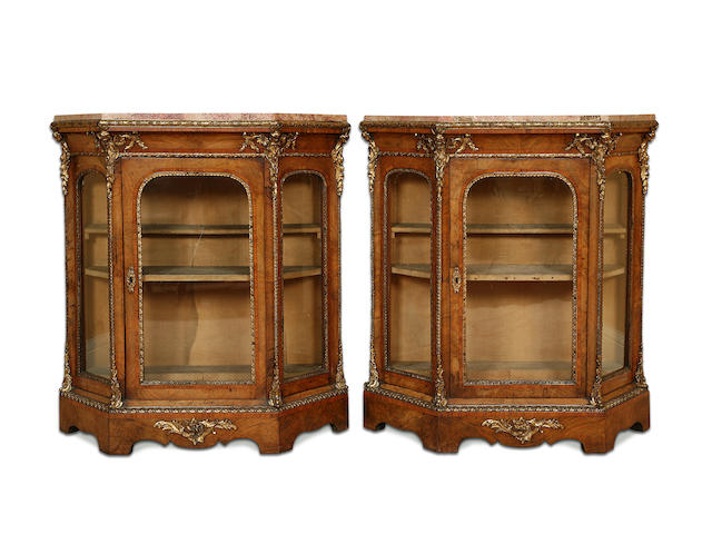 A pair of Victorian walnut, tulipwood banded and gilt metal mounted side cabinetscirca 1870