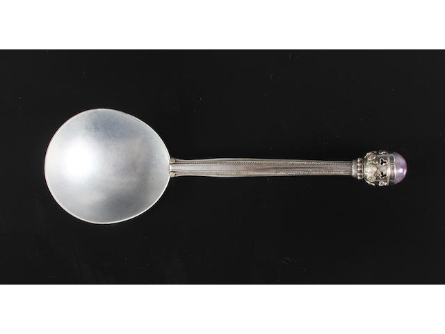 An Arthur and Georgie Gaskin Arts and Crafts spoon showing the influence of William Thomas Blackband Unmarked,