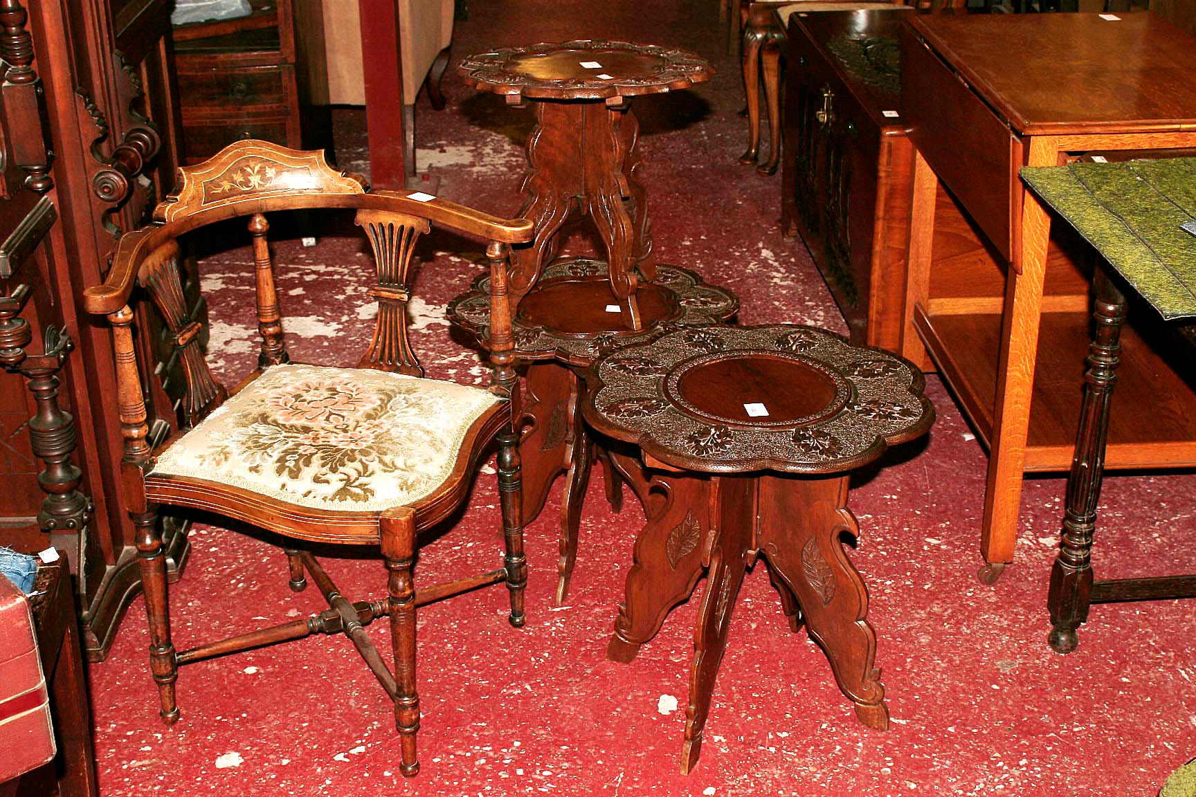 Three carved top tables