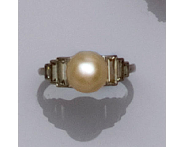 A diamond and pearl ring