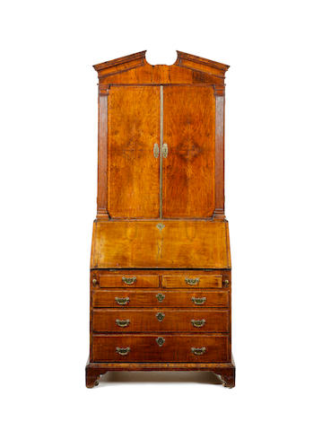 A George II walnut and featherbanded Bureau Cabinet