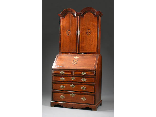 An oak, mahogany-crossbanded and inlaid dome-topped bureau cabinet, early 18th Century and later