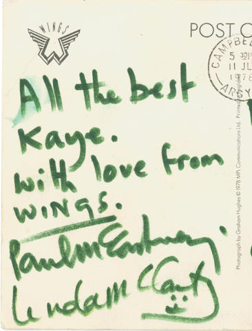 An autographed Wings publicity postcard,