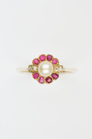 An early 20th century ruby, pearl and diamond cluster ring