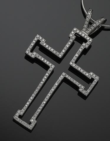 A diamond "Outline" cross pendant, by Theo Fennell,