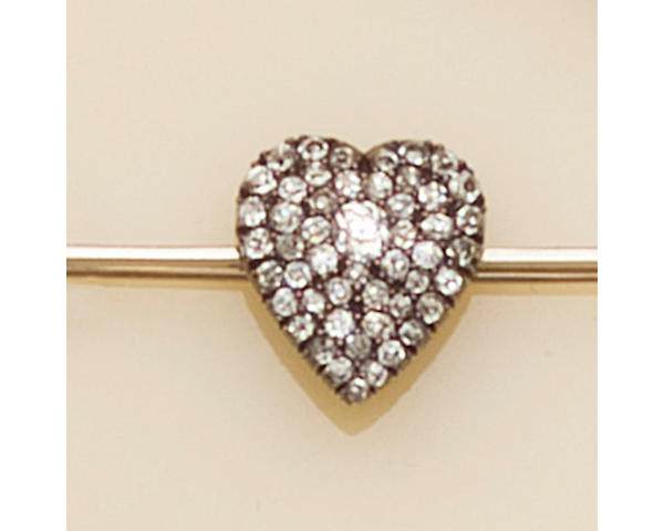A diamond heart bar brooch