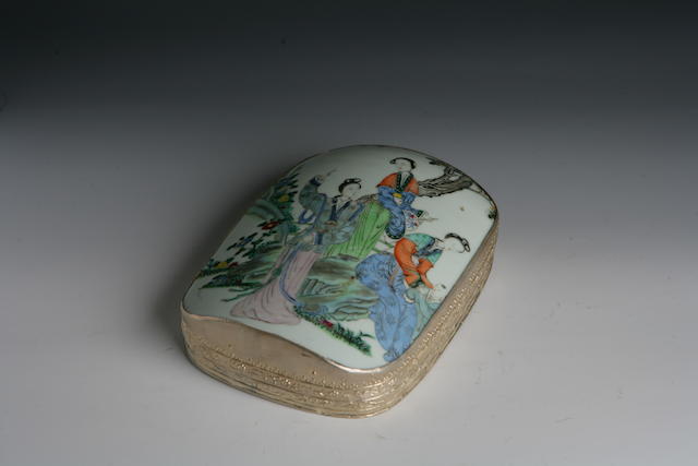 A porcelain topped white metal box and cover