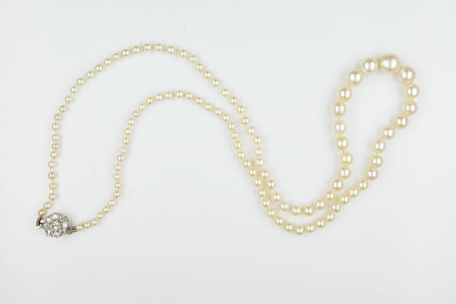 A cultured pearl and pearl necklace to a diamond clasp