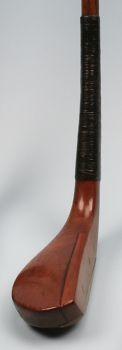 A light coloured fruitwood Hugh Philp long nose putter circa 1850s