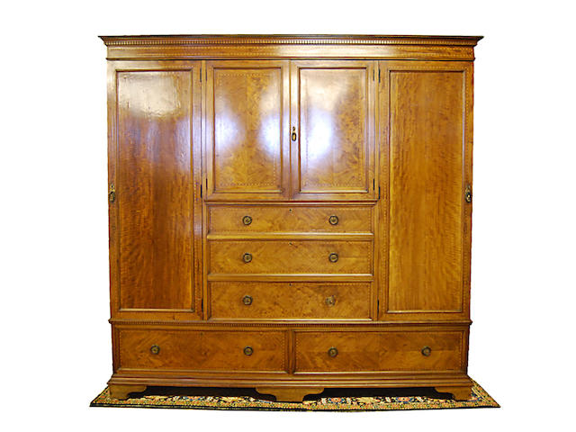 A large mahogany and inlaid wardrobe, early 20th Century