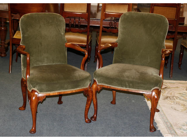 A set of nine George II style walnut armchairs