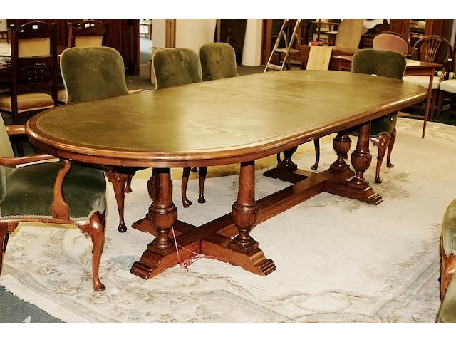 A mid 20th century walnut board room table
