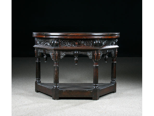 A mid 17th Century oak credence type table