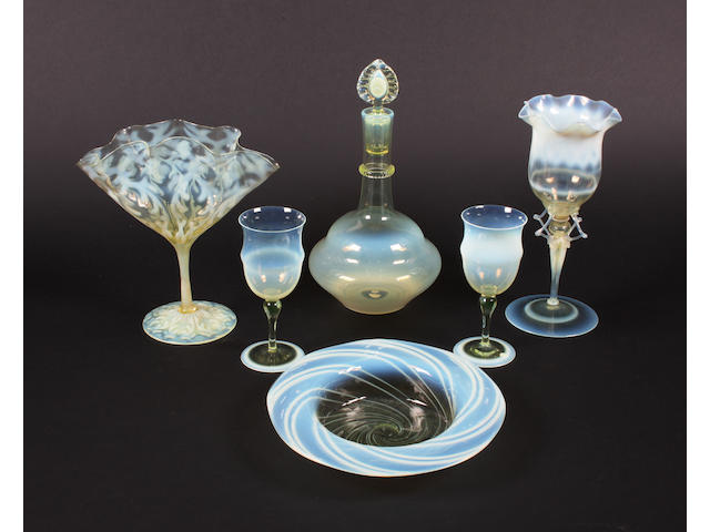 A John Walsh Walsh opalescent glass vase, a Whitefriars decanter and stopper, two glasses, a bowl and a goblet Late 19th Century