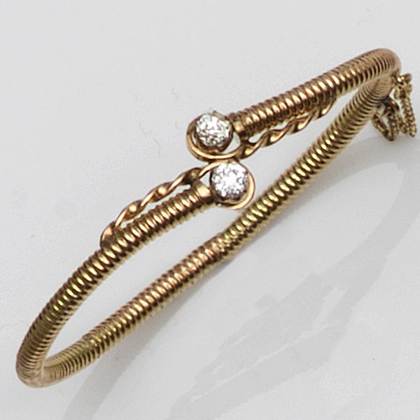 A Russian diamond hinged bangle