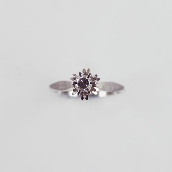 A diamond single stone ring