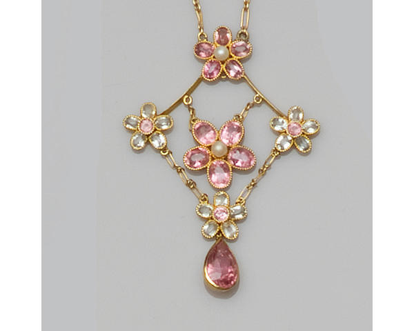 An Edwardian pink tourmaline and aquamarine floral pendant necklace