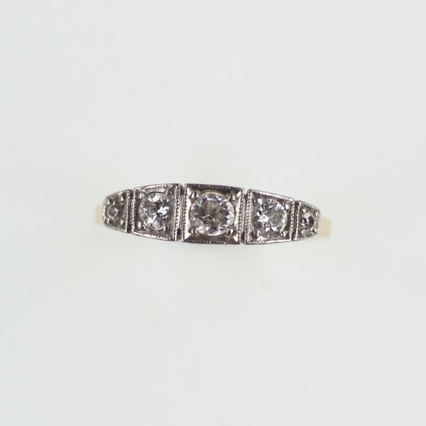 A diamond five stone ring