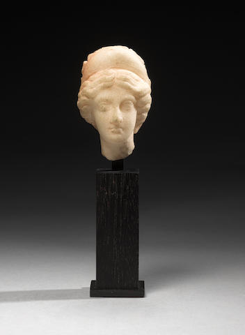 A small Hellenistic marble head of a goddess
