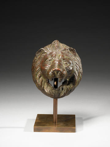 A Roman bronze lion head mount