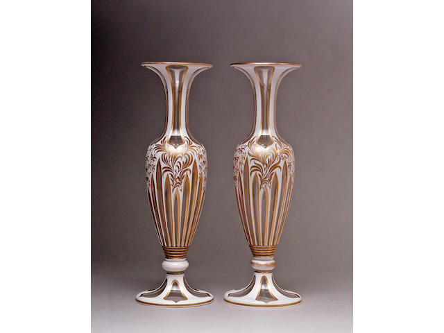 A pair of 19th Century white flashed and gilt decorated  Bohemian glass vases