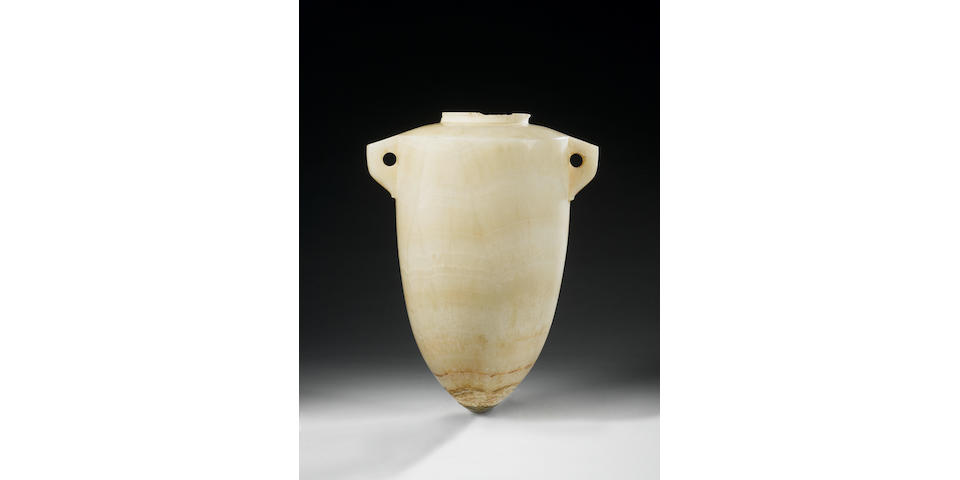 An Egyptian alabaster torpedo vase