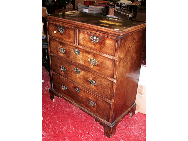 A George III walnut chest of drawers