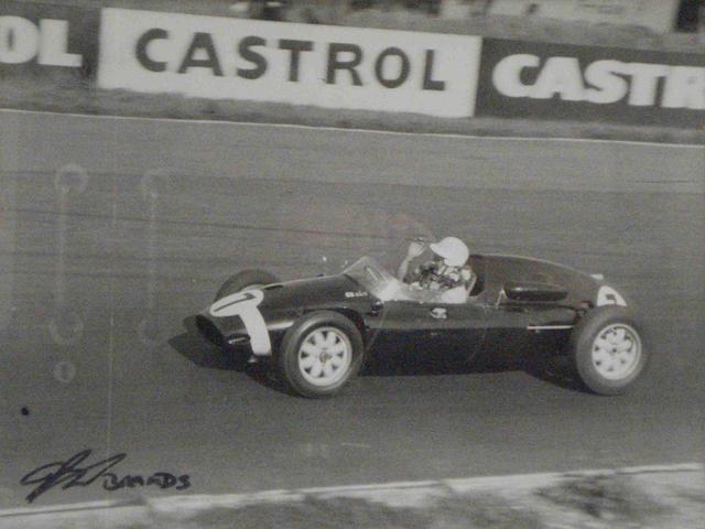 A photograph of Stirling Moss by Jim Gleave,