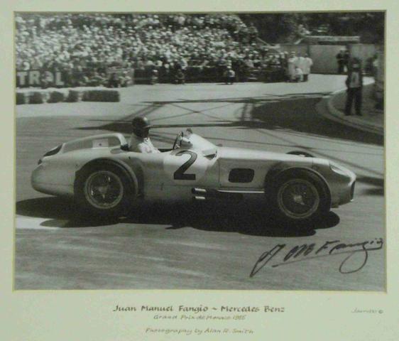 A signed photograph of Juan Manuel Fangio,