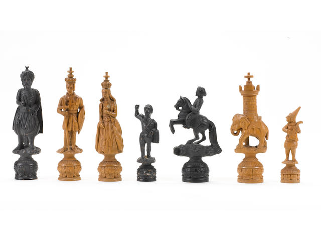 A carved boxwood figural chess part-set, Switzerland, circa 1870,